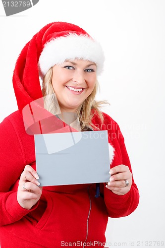 Image of joyful pretty santa woman with empty sign