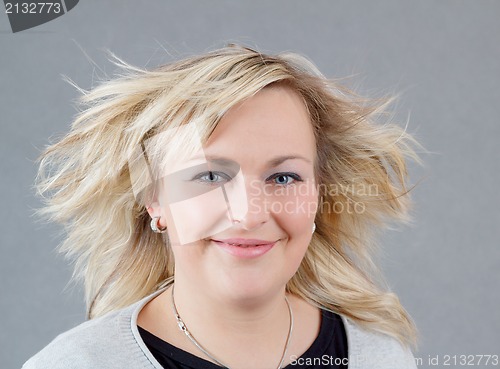 Image of cute smiling relaxing plump woman