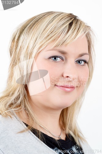 Image of cute smiling relaxing plump woman