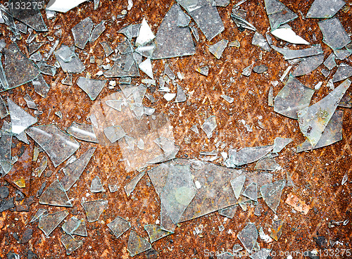 Image of Rusty metal floor with shards background