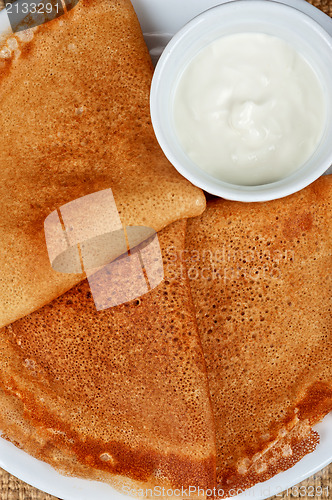 Image of pancakes with sour cream