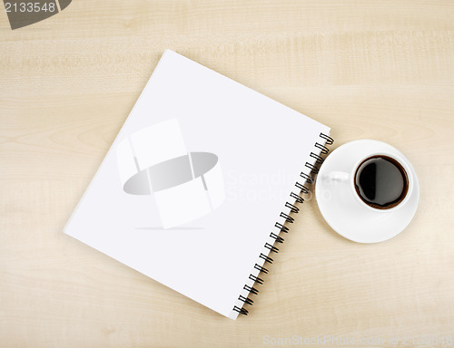 Image of White cup and white page