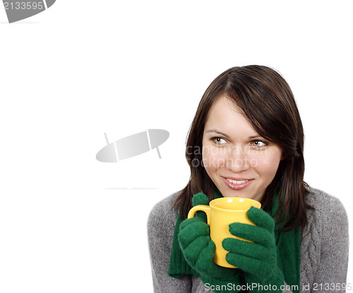 Image of Woman drinking a hot beverage 