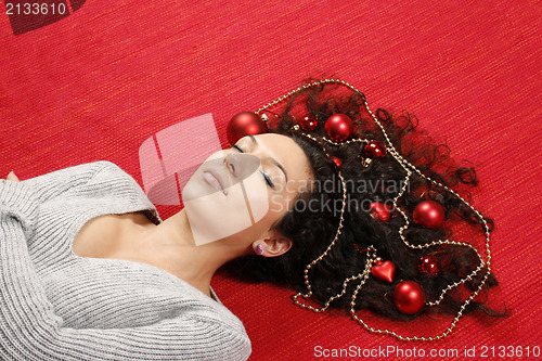 Image of Woman with christmas decorations