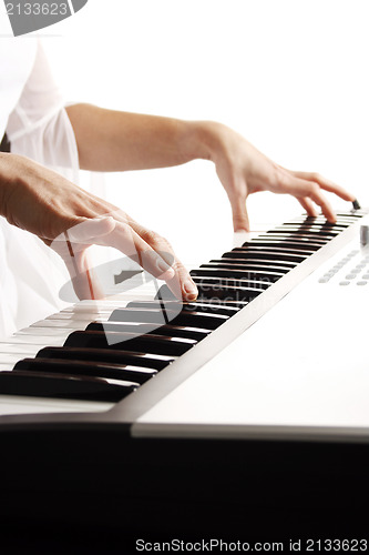 Image of Playing piano