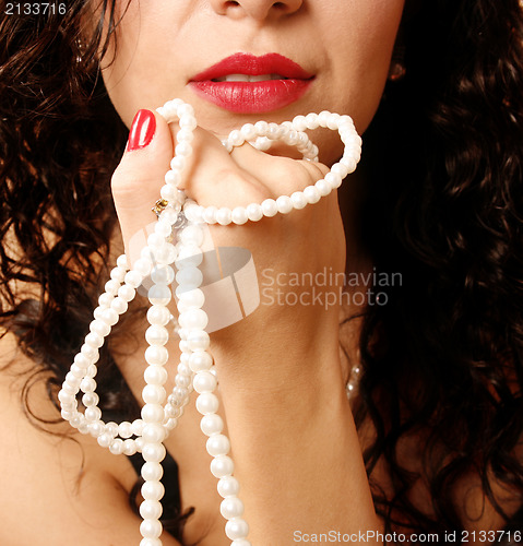 Image of Woman with pearl necklace