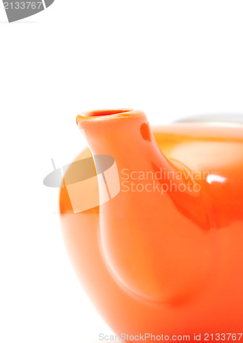 Image of Part of Orange Ceramic Teapot closeup