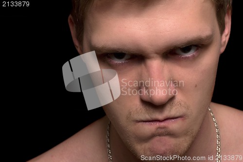 Image of portrait of a furious young man