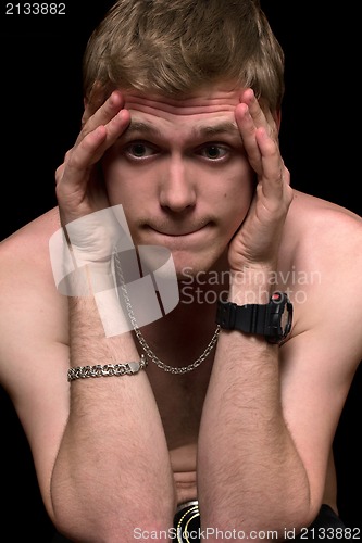 Image of stressed young man