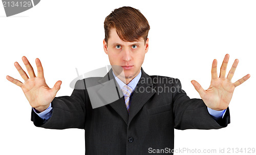 Image of Serious business man with stopping gesture isolated on white