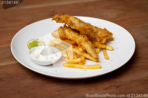 Image of Shrimp tempura dish with white sauce and fried potatoes