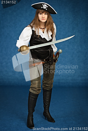 Image of Young woman in pirate suit with sabre