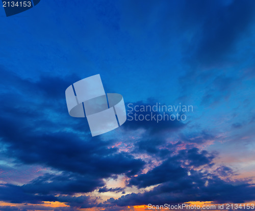 Image of Sunset on deep blue sky. Panorama from several photos.