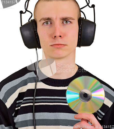 Image of Sad disappointed man with big headphones and CD