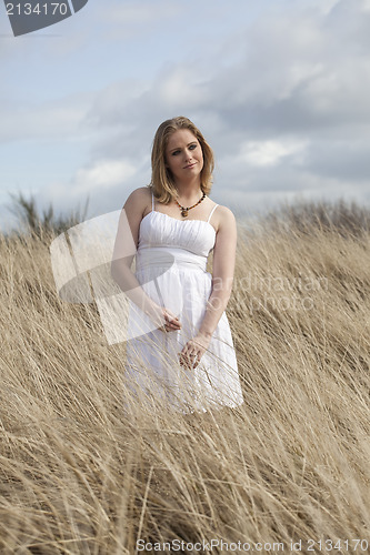 Image of Beautiful Young Blonde Woman on Beach 