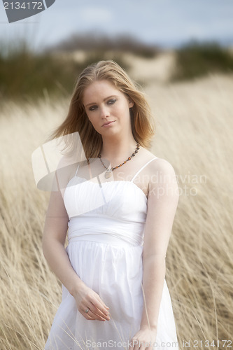 Image of Beautiful Young Blonde Woman on Beach 