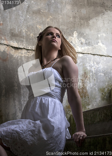 Image of Beautiful Young Blonde Woman with White Dress