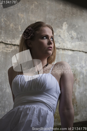 Image of Beautiful Young Blonde Woman with White Dress