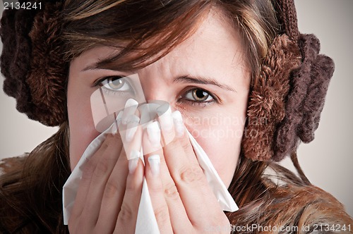 Image of Sick Woman Sneezing