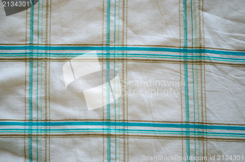 Image of closeup crumple shirt fabric green square shape texture background 