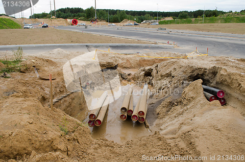 Image of electricity cable wire protective tube lay road construction 