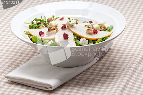 Image of Fresh pears arugula gorgonzola cheese salad