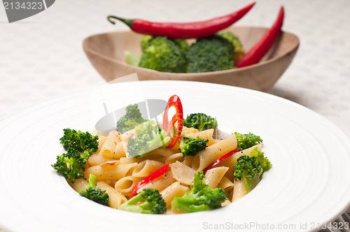 Image of Italian penne pasta with broccoli and chili pepper