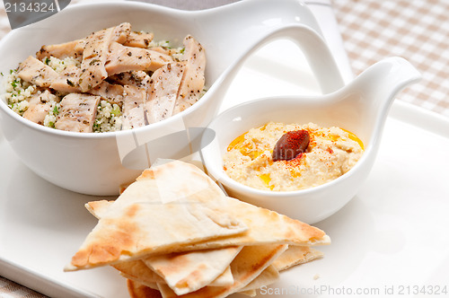 Image of chicken taboulii couscous with hummus