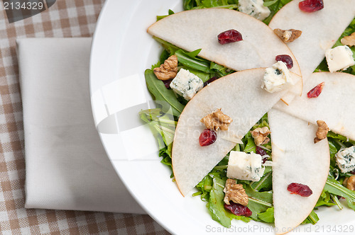 Image of Fresh pears arugula gorgonzola cheese salad