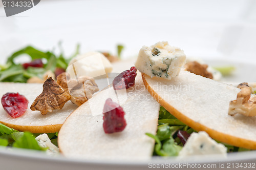 Image of Fresh pears arugula gorgonzola cheese salad