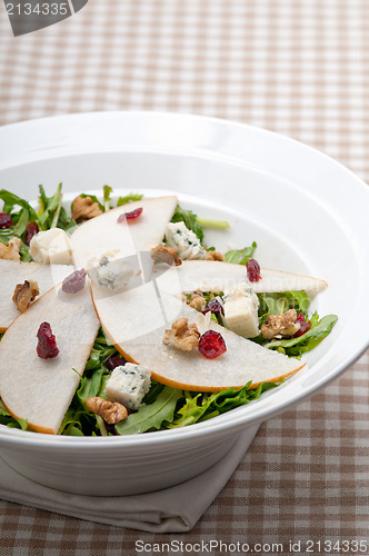 Image of Fresh pears arugula gorgonzola cheese salad
