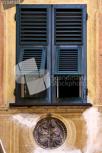 Image of green wood venetian blind  in portofino