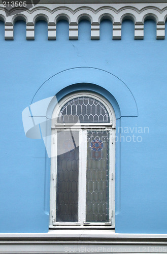 Image of Blue wall and a beautiful window