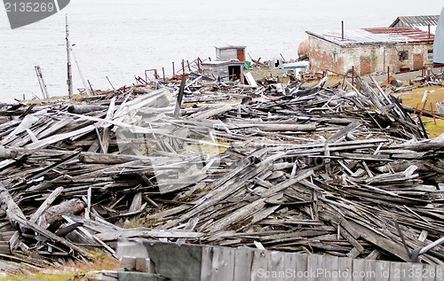 Image of the thrown logs and boards