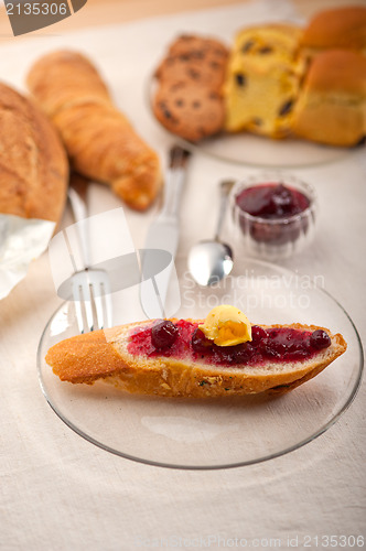 Image of bread butter and jam 