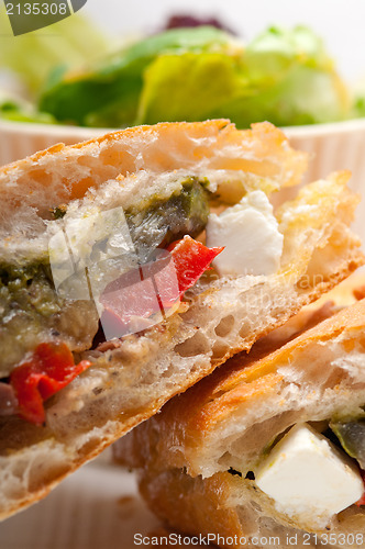 Image of ciabatta panini sandwichwith vegetable and feta