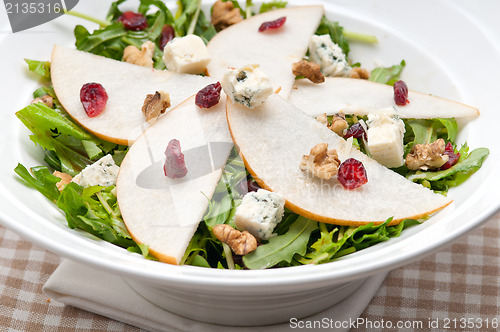 Image of Fresh pears arugula gorgonzola cheese salad