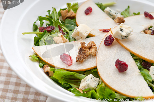 Image of Fresh pears arugula gorgonzola cheese salad
