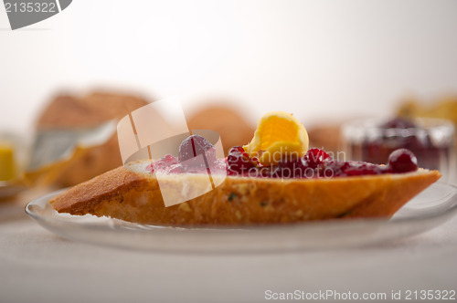 Image of bread butter and jam 