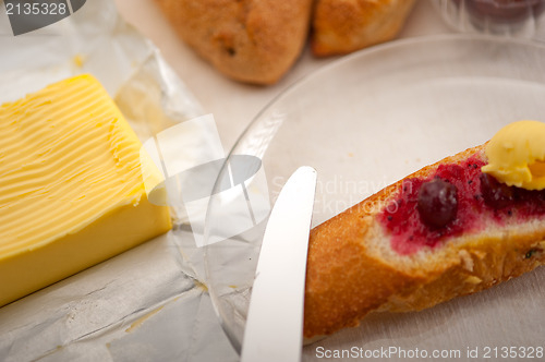 Image of bread butter and jam 
