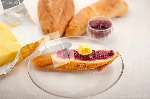 Image of bread butter and jam 