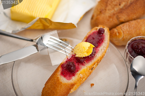 Image of bread butter and jam 