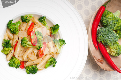 Image of Italian penne pasta with broccoli and chili pepper