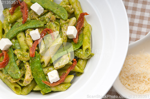 Image of Italian penne pasta with sundried tomato and basil