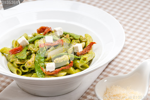 Image of Italian penne pasta with sundried tomato and basil