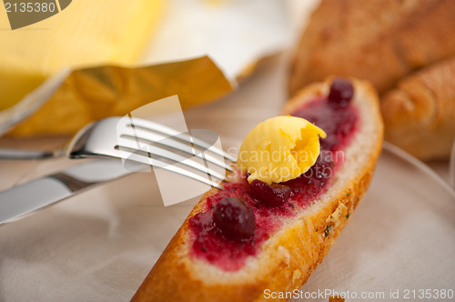 Image of bread butter and jam 