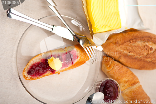 Image of bread butter and jam 