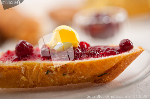 Image of bread butter and jam 
