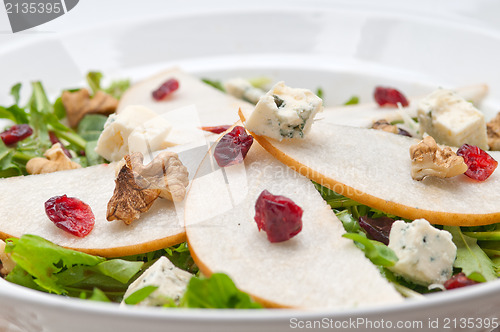 Image of Fresh pears arugula gorgonzola cheese salad