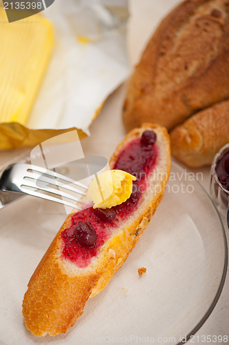 Image of bread butter and jam 